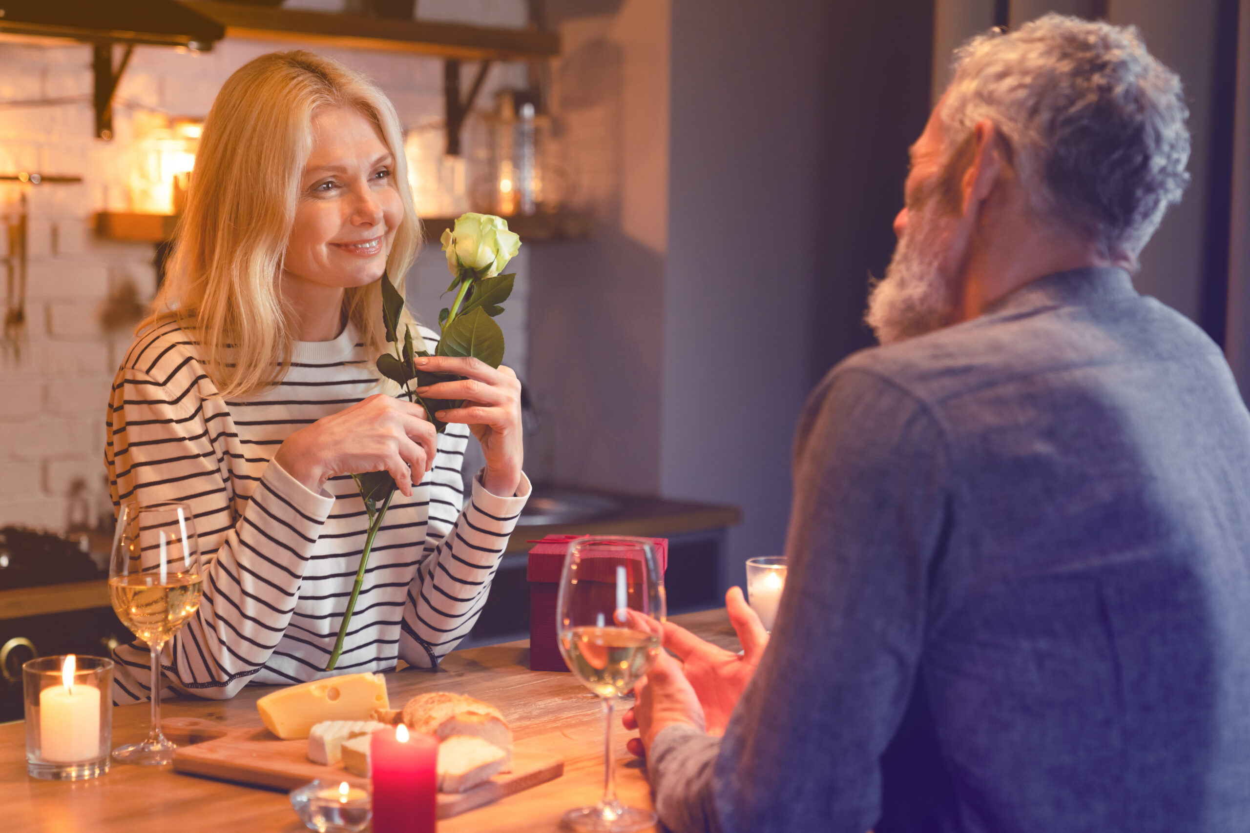Kropyvnytskyi Women conversation section image showing a refined couple sharing a warm, serious dinner conversation