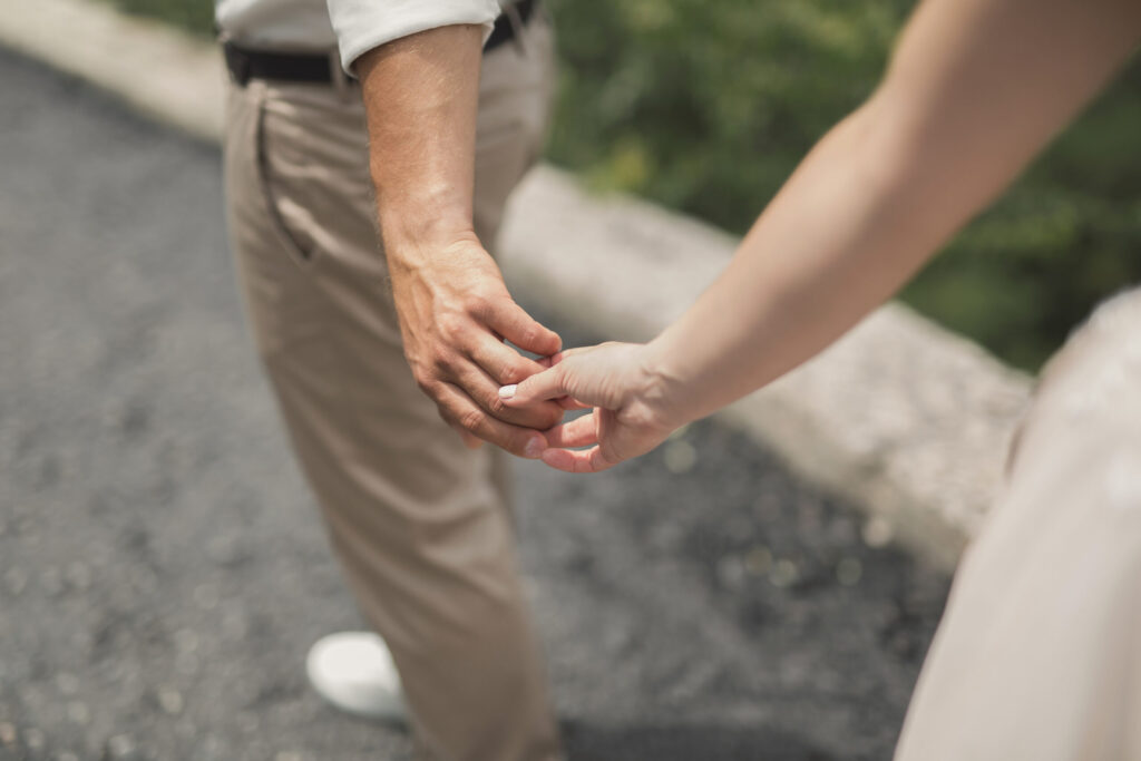Groom Keeps A Bride Hand And Walking